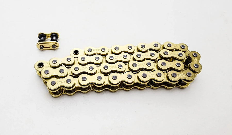 Warp 9 Surron Drive Chain — 420 O-Ring KMC gold chain with C-clip master link