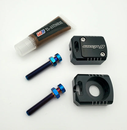 Warp 9 Lockdown axle blocks for Surron LBX — precision CNC aluminum chain adjuster blocks