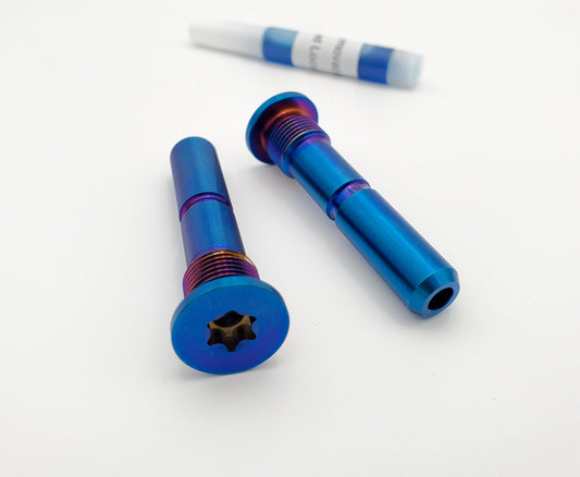 Stark Varg titanium foot peg pins in burnt blue finish