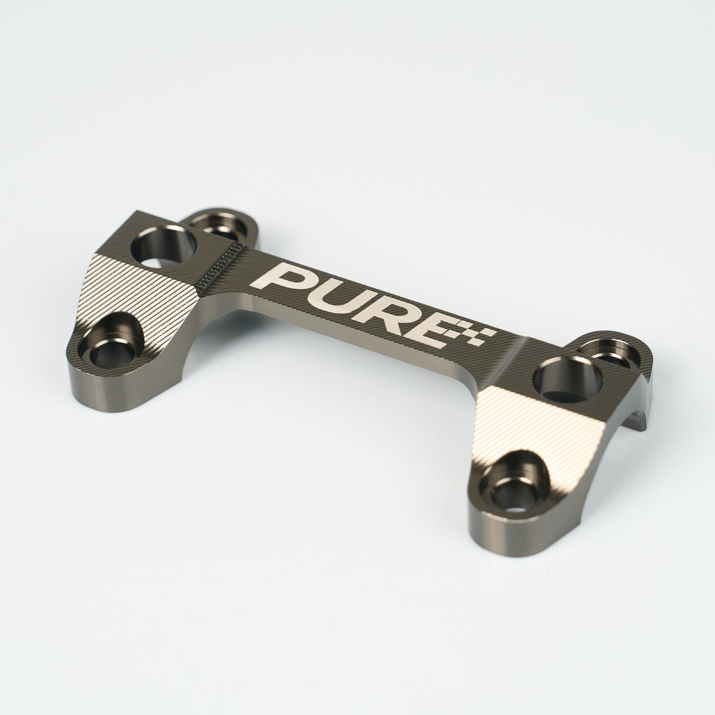 Pure Racing TRAXION Fork top stem — stem head and bearing interface detail