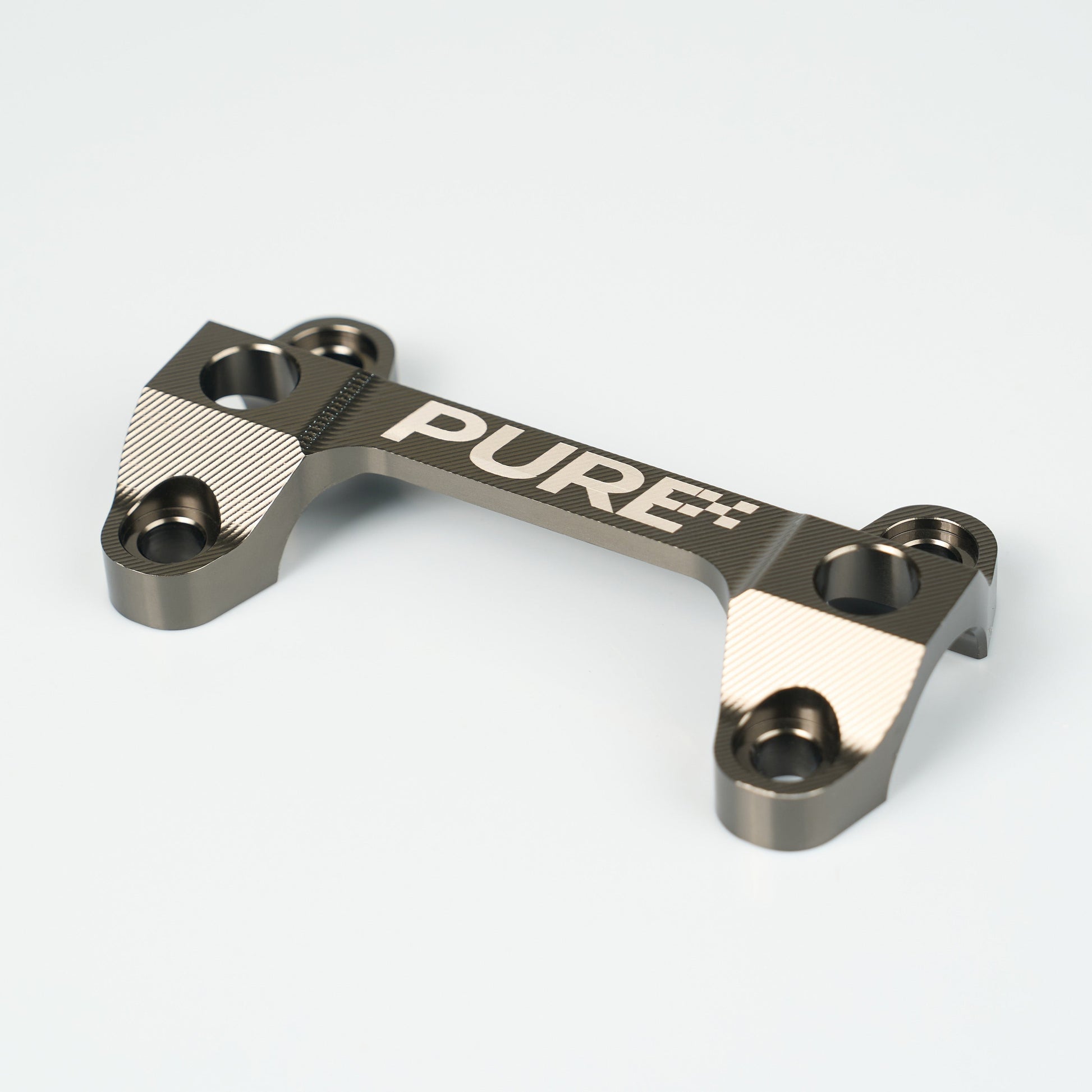 Pure Racing TRAXION Fork top stem — stem head and bearing interface detail