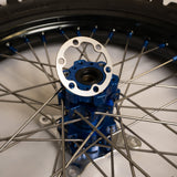 Prickly V3 rotor hub spacer for Surron LBX — installed on rear hub