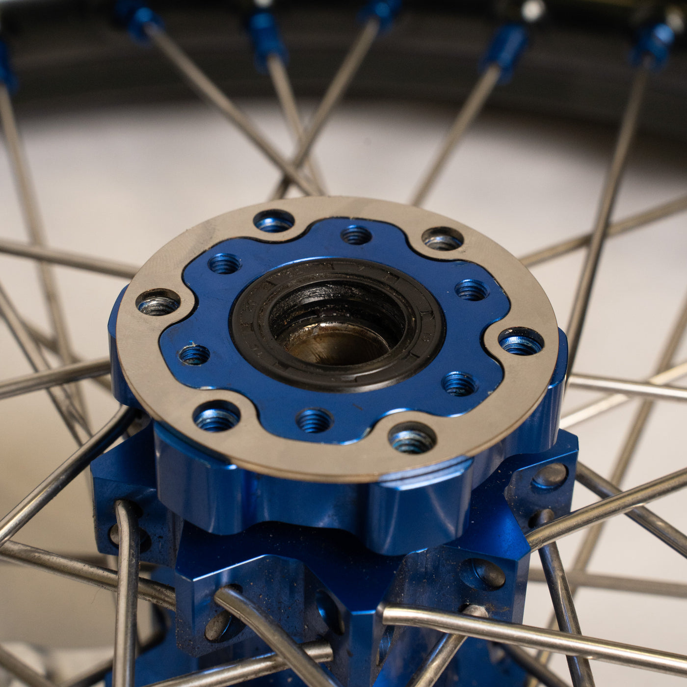Prickly V3 rotor hub spacer for Surron LBX — rotor alignment fit detail