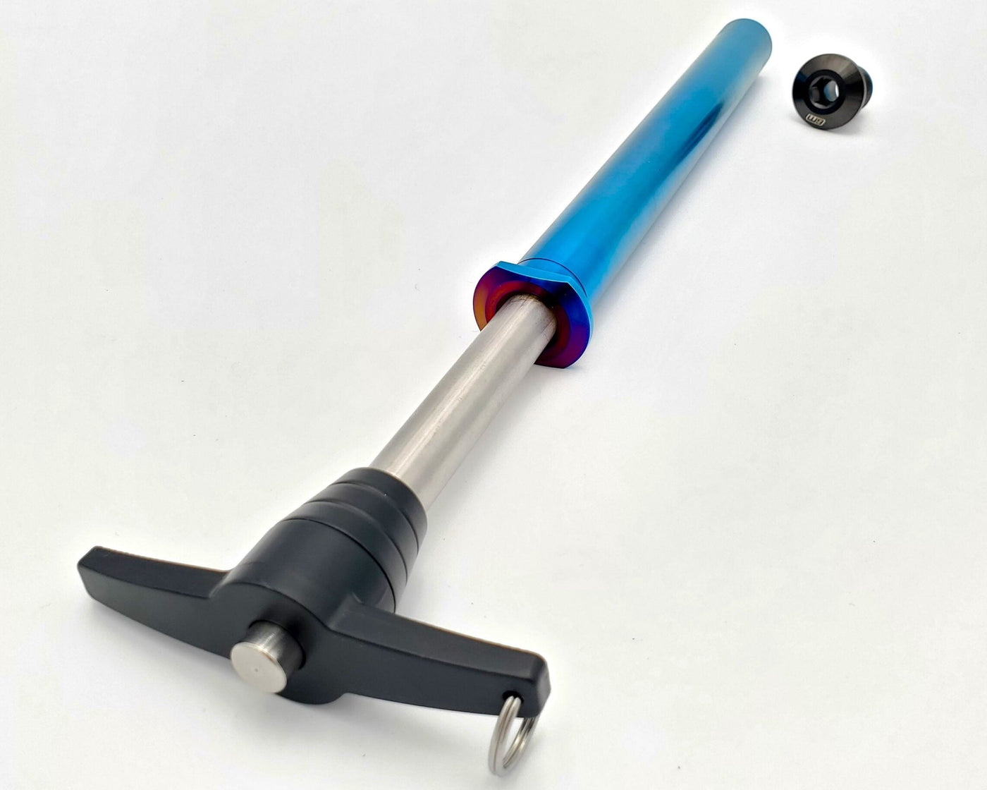 Stark Varg titanium rear axle with quick-pull tee handle in burnt blue