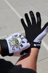 Skull and Crossbones riding gloves for e-moto riders — back of hand graphic