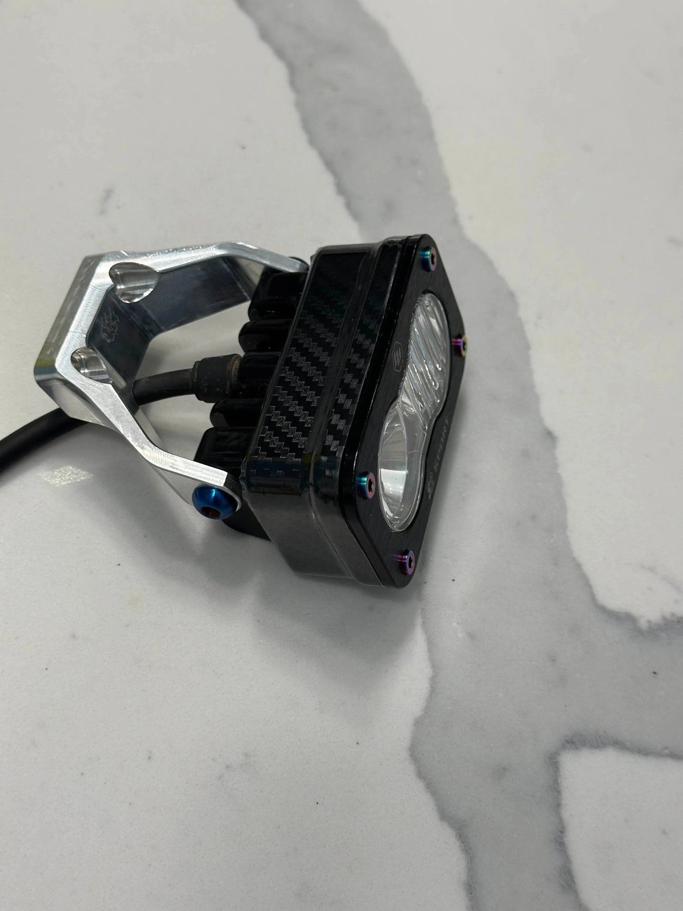 Baja Style Headlight Wrap for Surron & Talaria — carbon fiber pattern