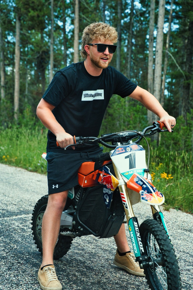Rider on the giveaway RTR, orange seat cover visible