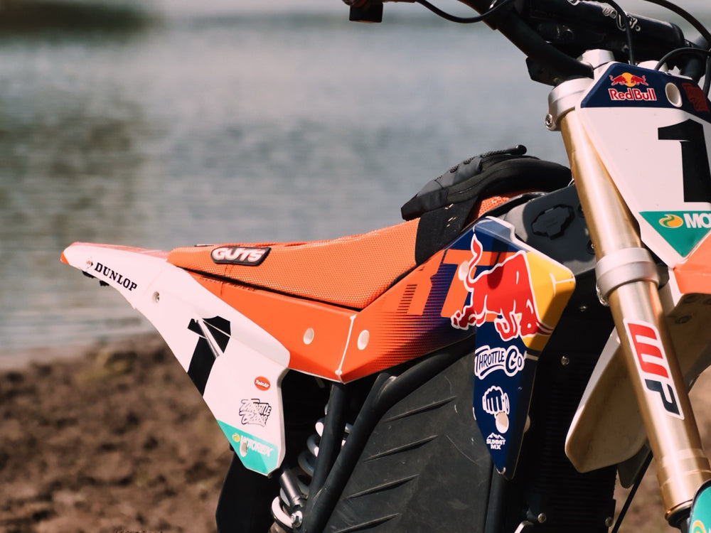 Guts Racing orange seat cover on the giveaway RTR