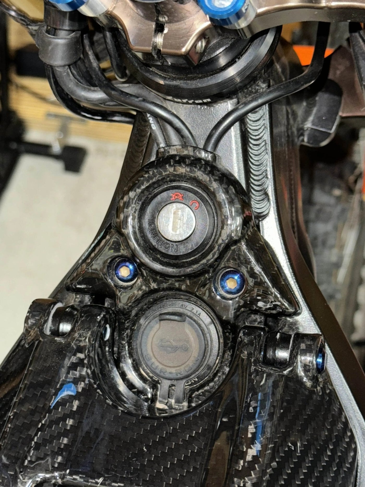 Surron Light Bee X carbon fiber wrap kit — side panel finish