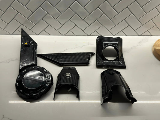 Talaria XXX carbon fiber wrap kit — full body panel coverage