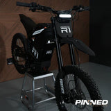 ReRode R1 electric dirt bike — rear three-quarter view