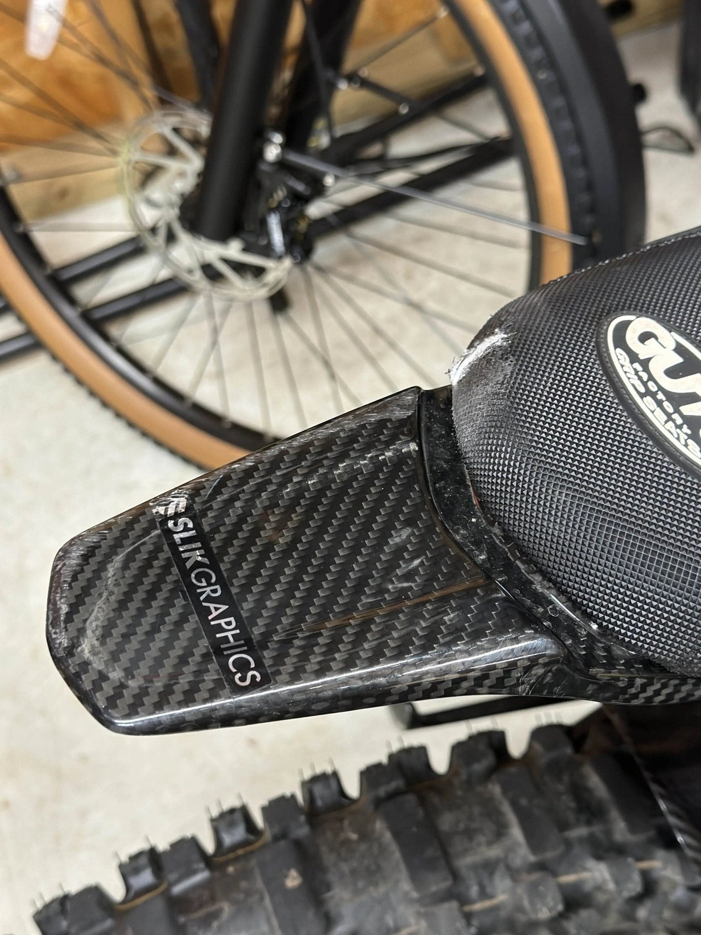 Surron Light Bee X carbon fiber wrap kit — real CF weave detail