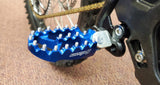 Warp 9 foot pegs for Surron Light Bee X — blue anodized
