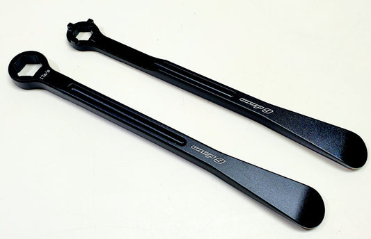 Surron tire lever and trail multi-tool set in forged black aluminum