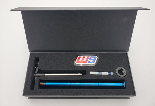 Titanium quick-pull rear axle for Surron Ultra Bee — burnt blue