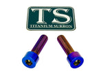 Titanium caliper bolts for Surron Ultra Bee — installed on brake