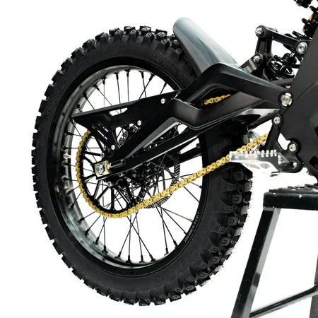 Ventus One Plus electric dirt bike — rear suspension and brake disc detail