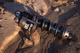 EXT REA MX rear shock for Surron Ultra Bee — 40mm damper body with piggyback reservoir, pre-tuned by EXT-USA